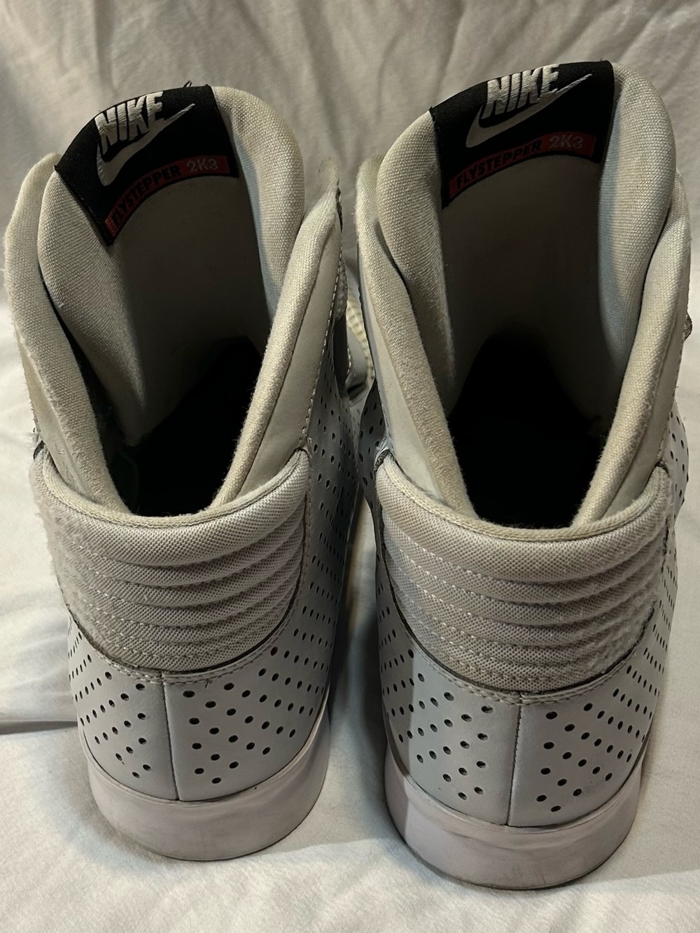 Nike Men’s White Perforated High-Top Sneakers with Black Tongue Logo